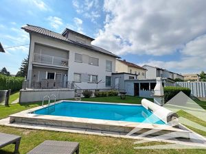 Pasching/Langholzfeld: Gartenwohnung mit Pool & Terrasse in begehrter Lage