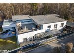 Moderne 4-Zimmer-Wohnung mit 96 m² Dachterrasse und 2 Parkplätzen!