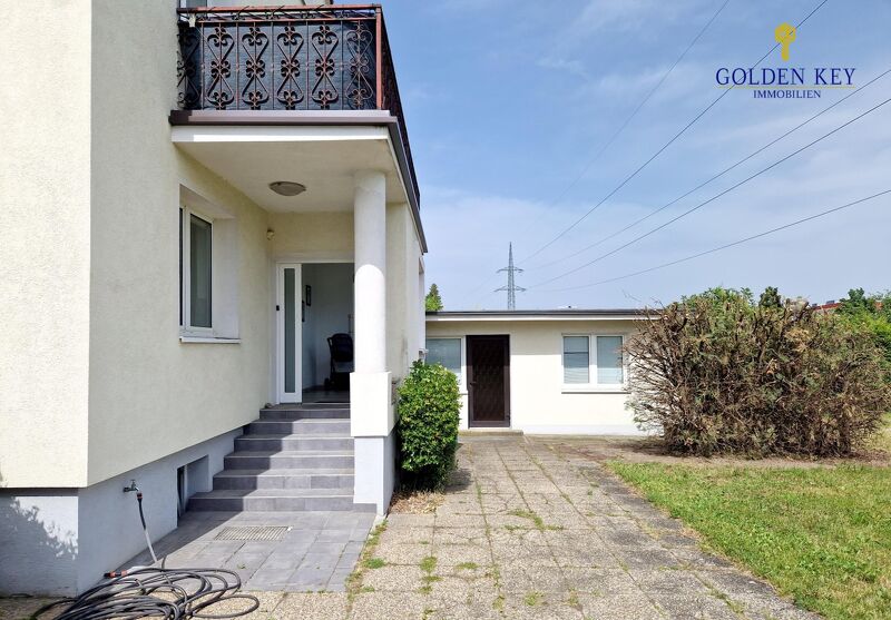3 - Familienhaus mit getrennten Eingängen und sonnigem Garten!
