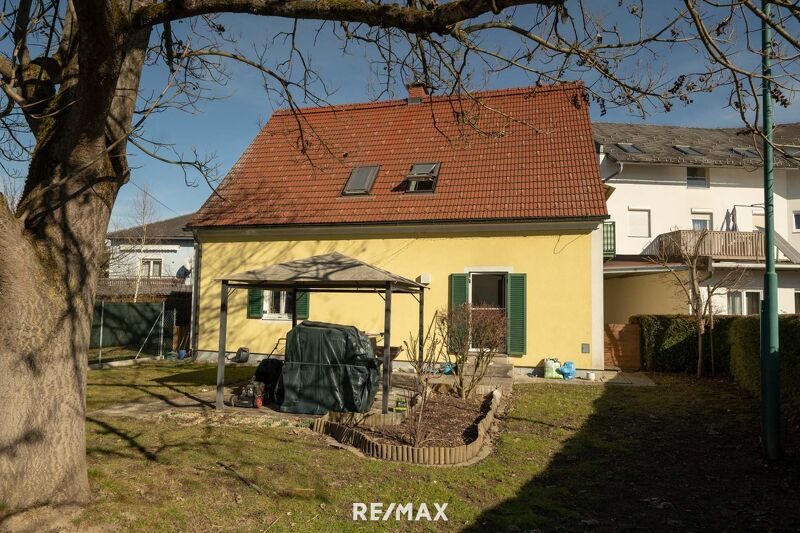 Eigentumswohnung mit Garten, Terrasse und Parkplatz - EG