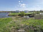 Sonniges Grundstück mit Bootsanlegeplatz