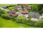 Tolle Liegenschaft mit einem Einfamilienhaus und urigem Bauernhaus mit Garagen und Stallgebäude