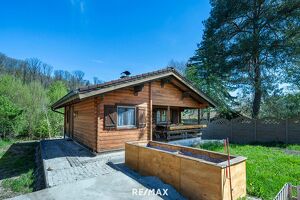 ?Wohnen im Einklang mit der Natur ? Stilvolles Holzhaus in traumhafter Ruhelage auf unverbaubarem Grundstück?