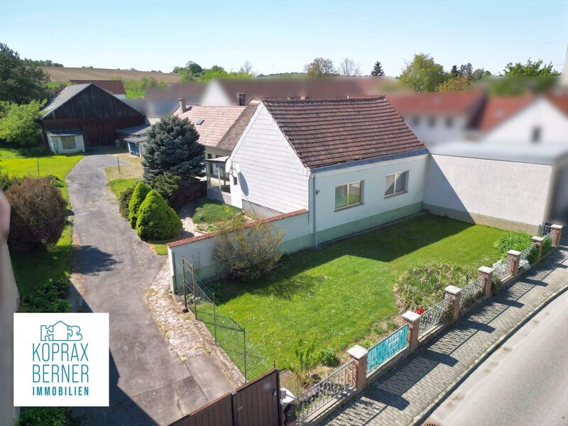 Idyllische Liegenschaft mit Haus, Weinkeller und Grünland