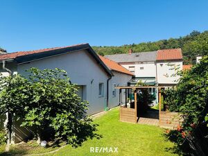 Einfamilienhaus mit Garage & Wintergarten in Ortsrandlage