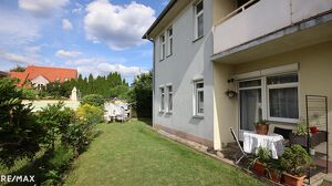 FREUNDLICHE WOHNUNG MIT GARTENNUTZUNG UND PARKPLATZ