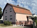 Einfamilienhaus mit geräumigen Scheune und viel Grünland!