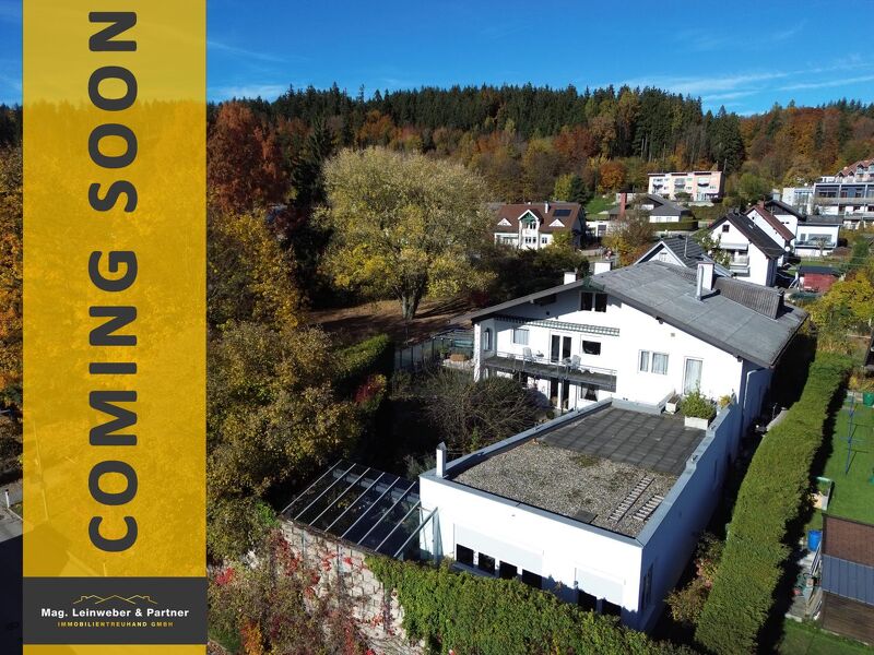 Leistbarer Wohntraum für 2 Familien mit XXL-Wintergarten, bombastischer Dachterrasse, großzügiger Gartenoase, Schwimmteich, Garage & Doppelcarpor