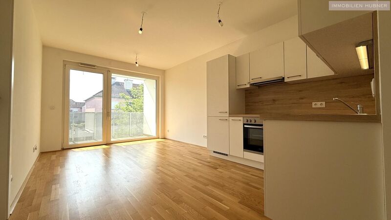 Kompakte + günstige Neubauwohnung mit MEGA-SÜD-LOGGIA (11,70m²) nahe Akademiepark