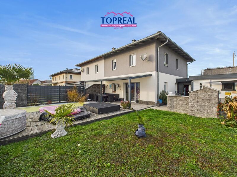 Neuwertige Doppelhaushälfte mit Wellnessgarten & hochwertiger Ausstattung ? ein Familienzuhause, das jeden Tag besonders macht