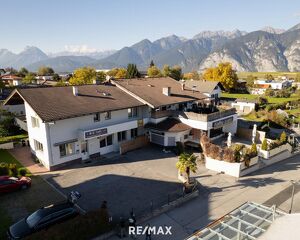 Liegenschaft mit Wohnungen- und Gewerbeeinheiten