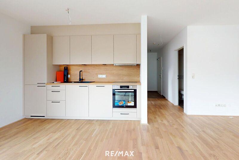 Erstbezug: 2-Zimmerwohnung mit Garagenplatz und Bergblick!