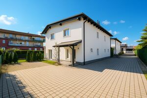 Neuwertige Doppelhaush&auml;lfte in sonniger Lage mit Mieter f&uuml;r Anleger