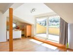 Sonnige 4 Zi-Dachgeschosswohnung mit Terrasse und Balkon!