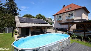 Mehrfamilienhaus mit Pool, Garage und Garten zu verkaufen