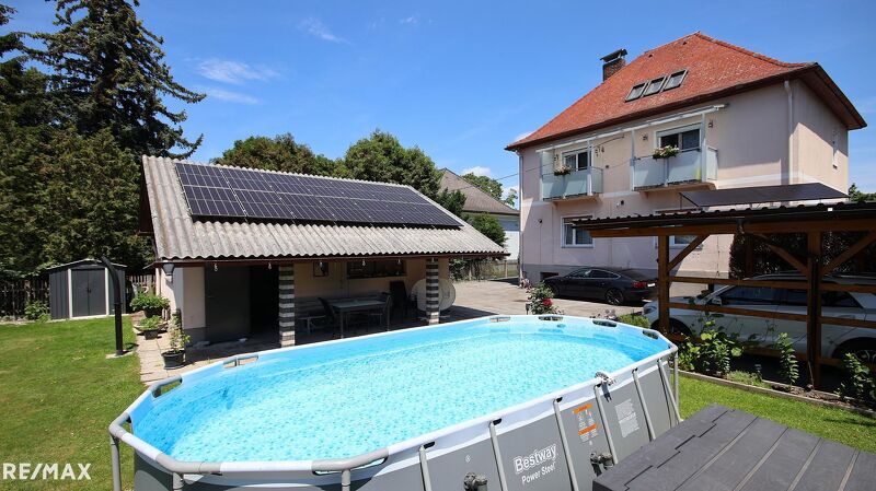Mehrfamilienhaus mit Pool, Garage und Garten zu verkaufen